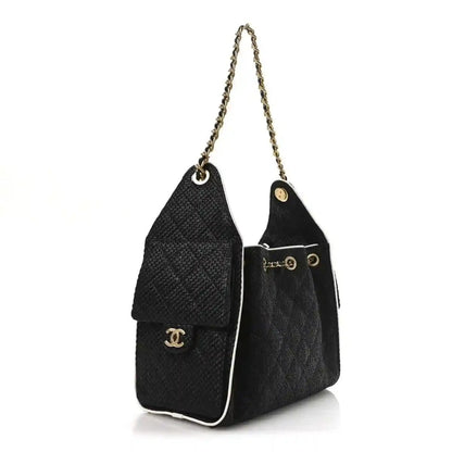 Chanel small handbag with two-tone sides, chain handles, and front logo hardware