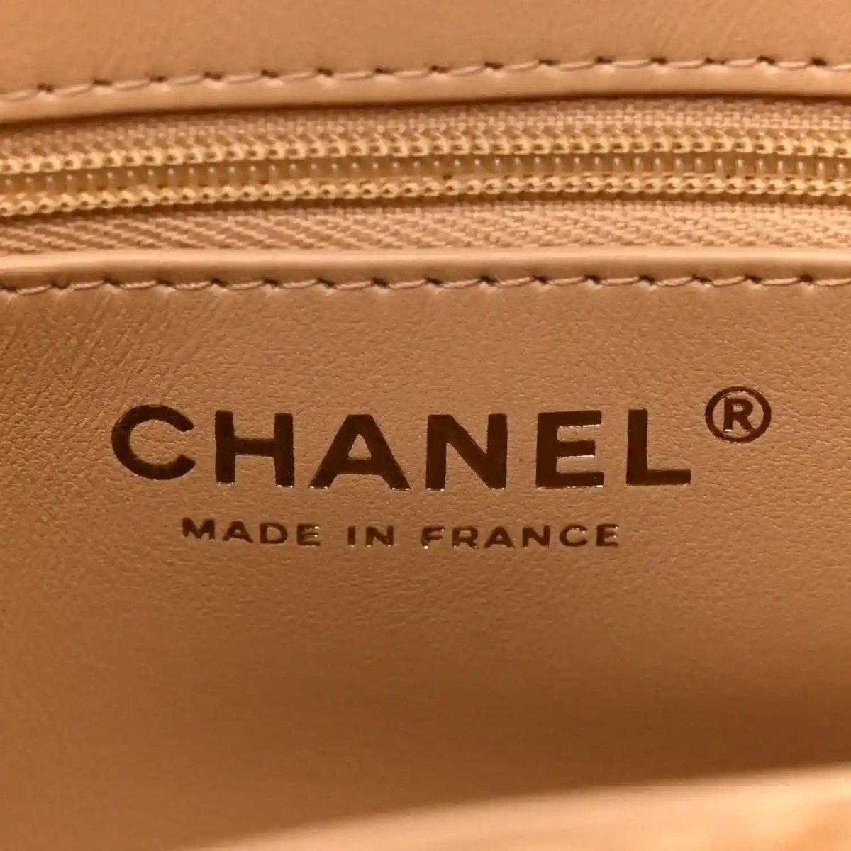 Chanel embossed label reading “CHANEL” and “MADE IN FRANCE” inside bag