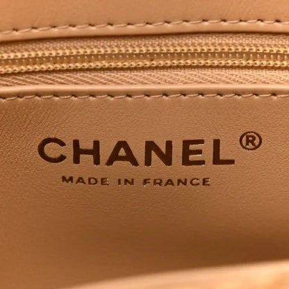 Chanel embossed label reading “CHANEL” and “MADE IN FRANCE” inside bag