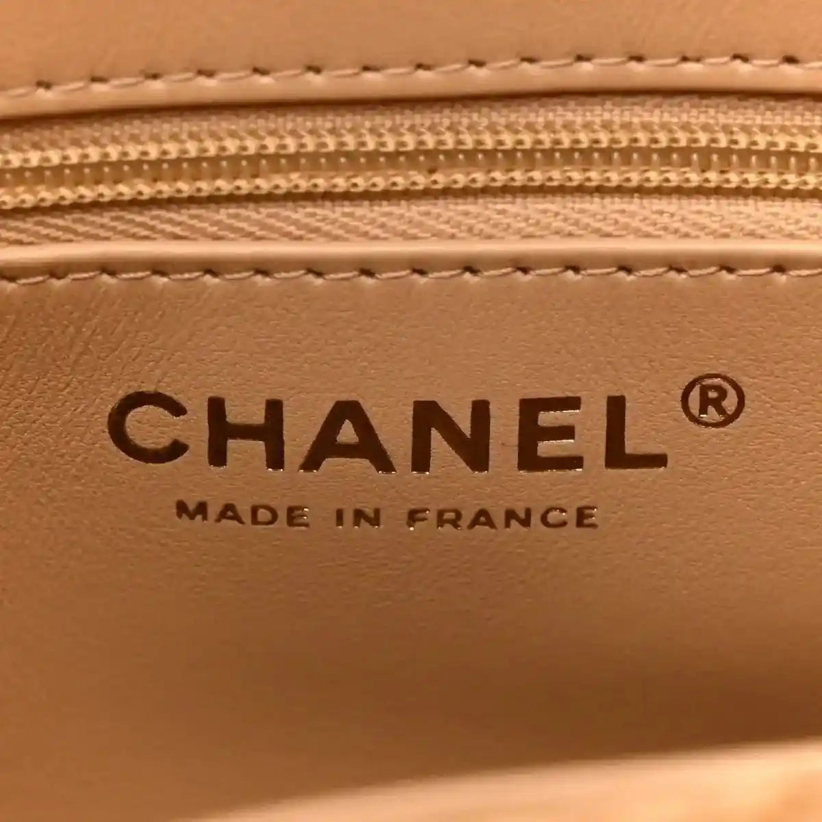 Chanel embossed label reading “CHANEL” and “MADE IN FRANCE” inside bag