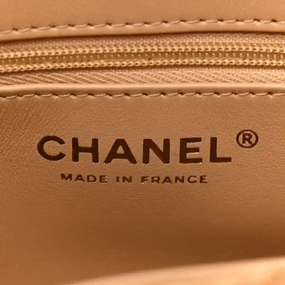 Chanel embossed label reading “CHANEL” and “MADE IN FRANCE” inside bag