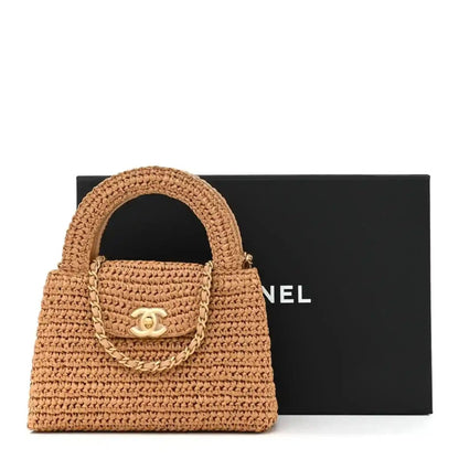 Dark beige braided raffia nano handbag with Chanel turn-lock and top handle