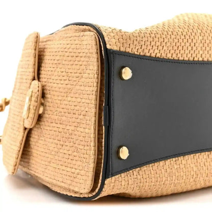 Beige raffia small handbag with black side band and gold snap studs