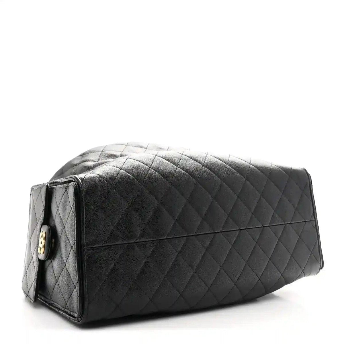Black quilted leather shoulder bag with top zipper and gold-tone corner tag