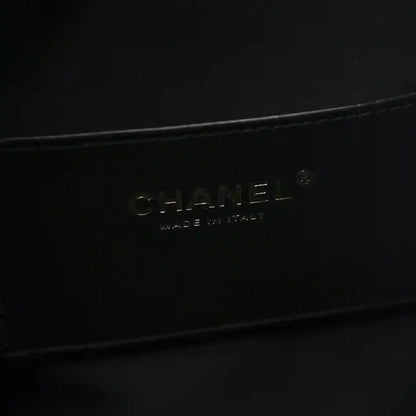 Black handbag lining with embossed brand lettering