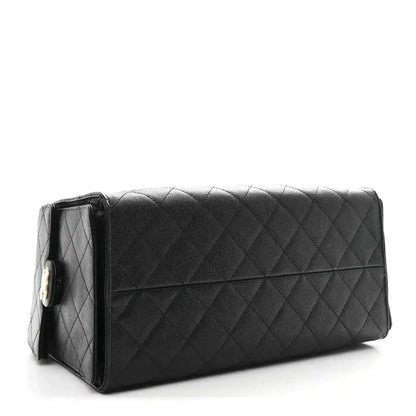 Black caviar quilted rectangular handbag with flap and diagonal quilting panel