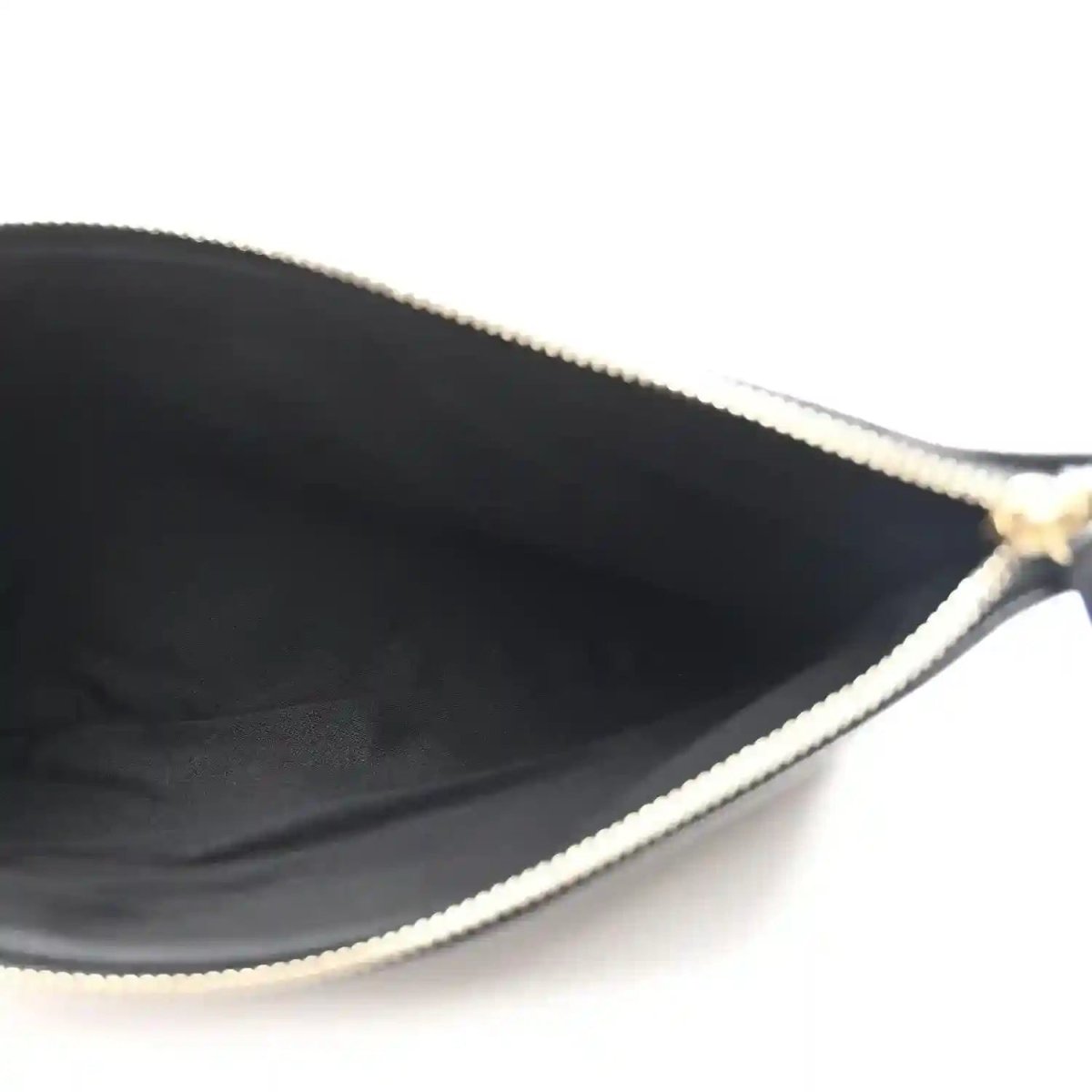 Black interior with chain and zipper-edge trim detail