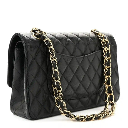 Chanel quilted caviar leather medium double flap bag with gold chain strap, side view