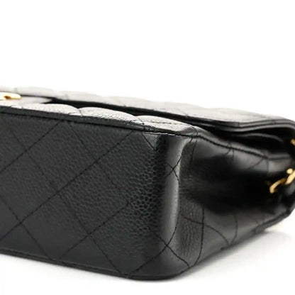 Chanel caviar leather quilted medium double flap bag with leather flap edge