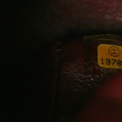 Leather authenticity stamp with 1970 marking inside the bag