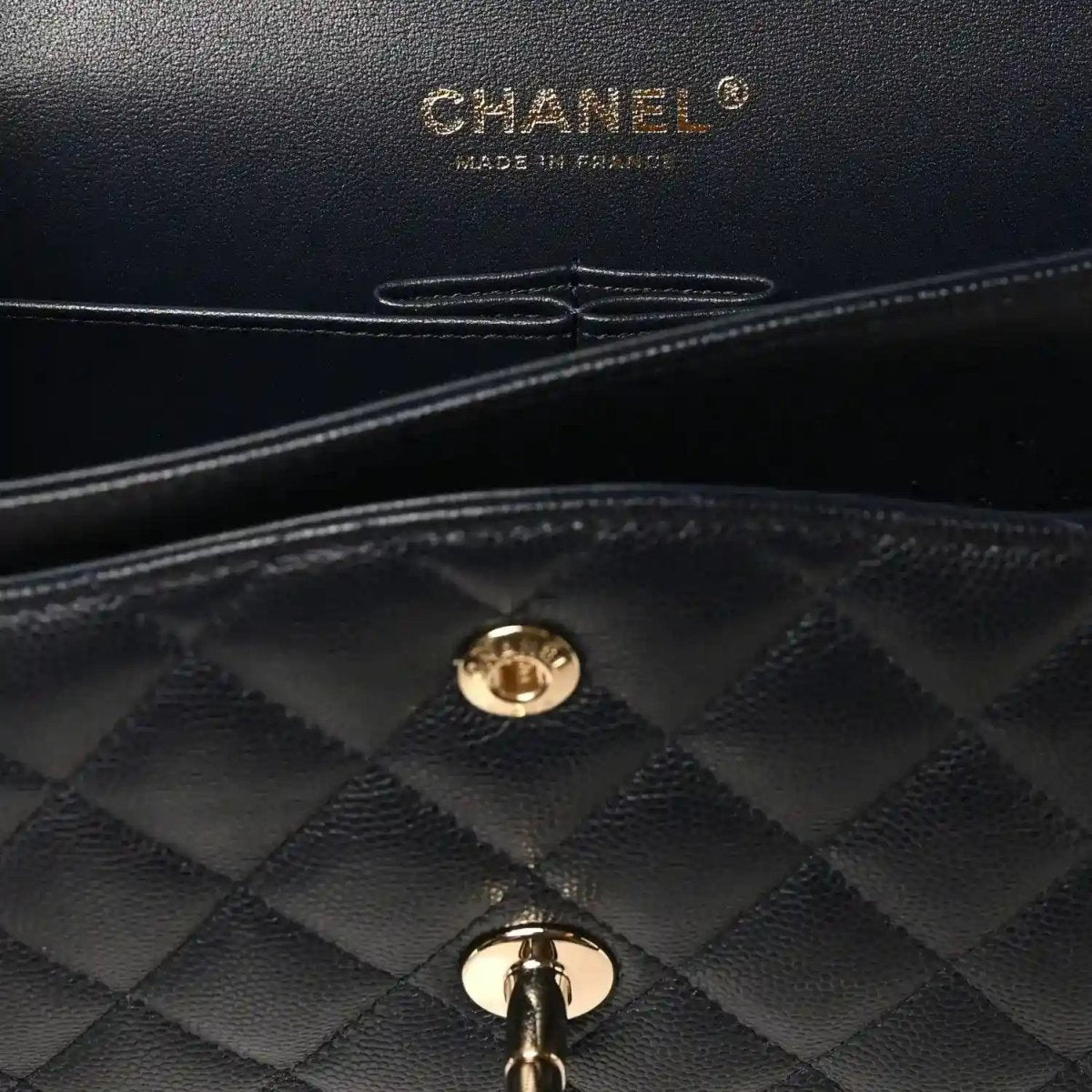 Quilted caviar leather double-flap bag with gold CC hardware and top clasps