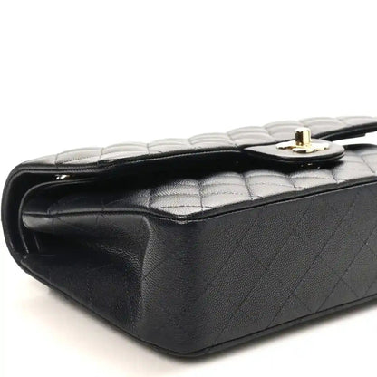 Quilted caviar leather medium flap bag with gold turn-lock on top