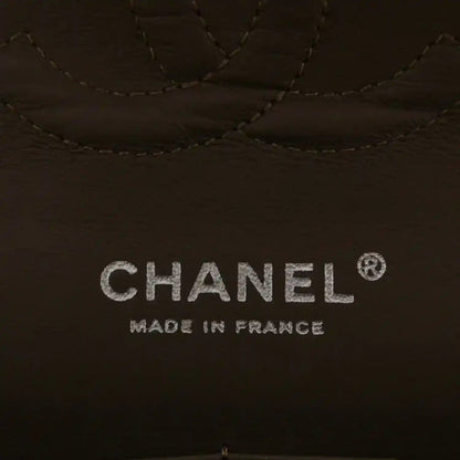 Dark interior lining with stitched diamond pattern and Chanel “Made in France” text