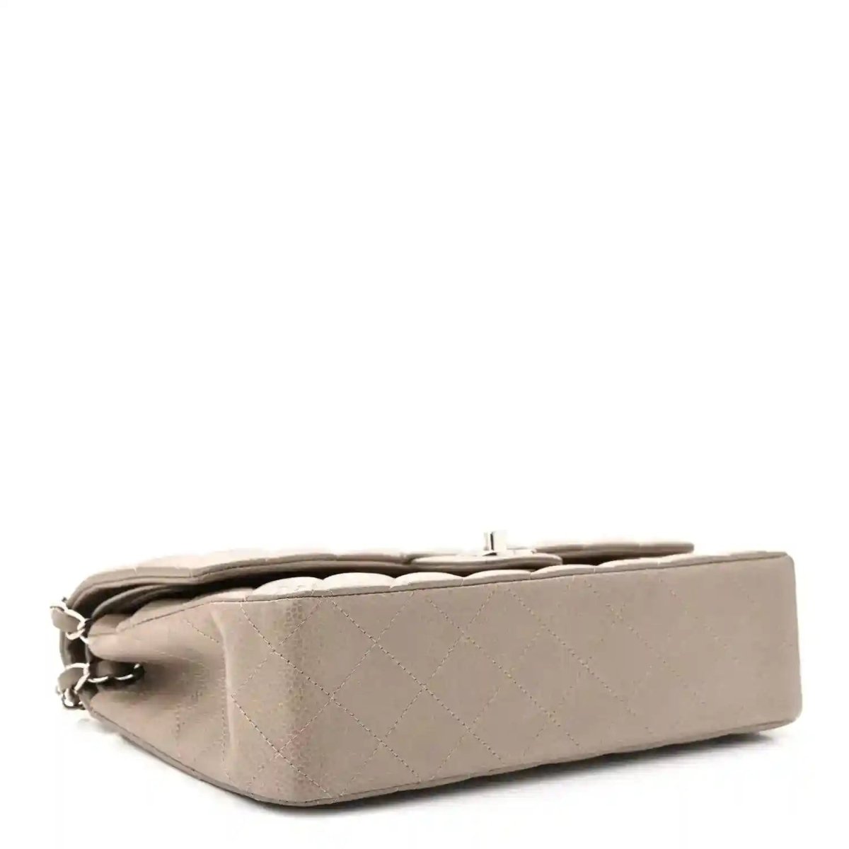 Taupe quilted leather flap bag angled view with silver chain strap and top opening