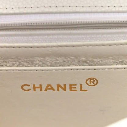 White Chanel caviar leather zipper trim detail with stitched edge