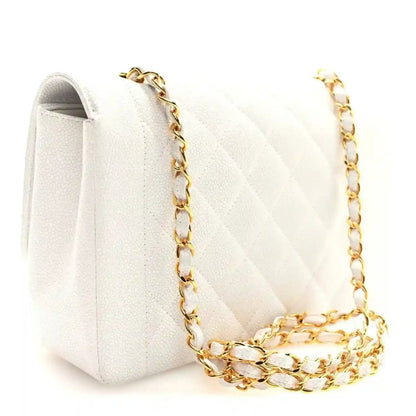 White Chanel caviar quilted single-flap bag with gold chain and open side view