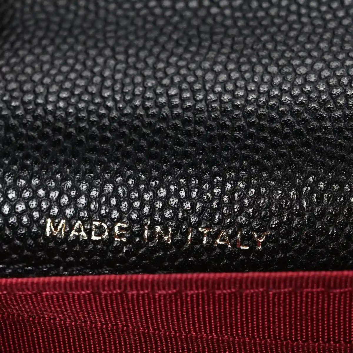Chanel caviar quilted mini wallet on chain close-up with “MADE IN FRANCE”