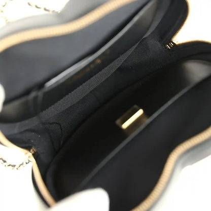 Chanel heart bag interior lining with zip-top opening and black fabric lining