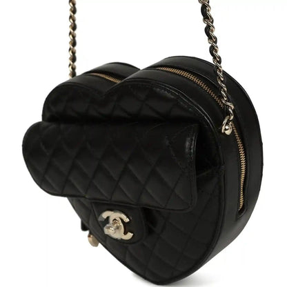 Chanel heart crossbody bag, quilted lambskin, gold zipper, CC logo on front, black