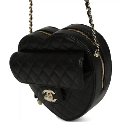 Chanel heart crossbody bag, quilted lambskin, gold zipper, CC logo on front, black