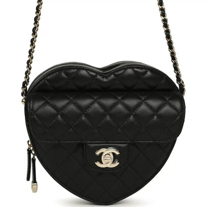 Chanel heart-shaped lambskin bag with quilted pattern, CC logo, chain strap, black