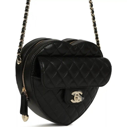 Chanel heart bag with quilted lambskin, gold-tone CC logo, chain strap, black