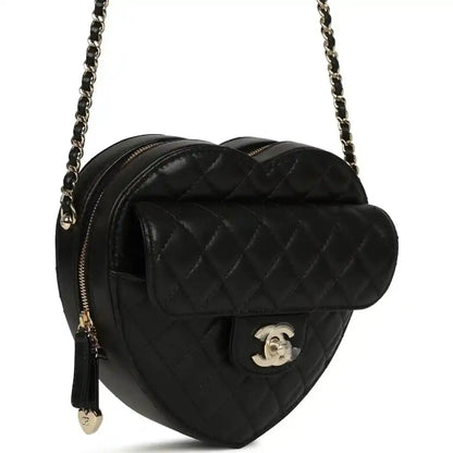Chanel heart bag with quilted lambskin, gold-tone CC logo, chain strap, black