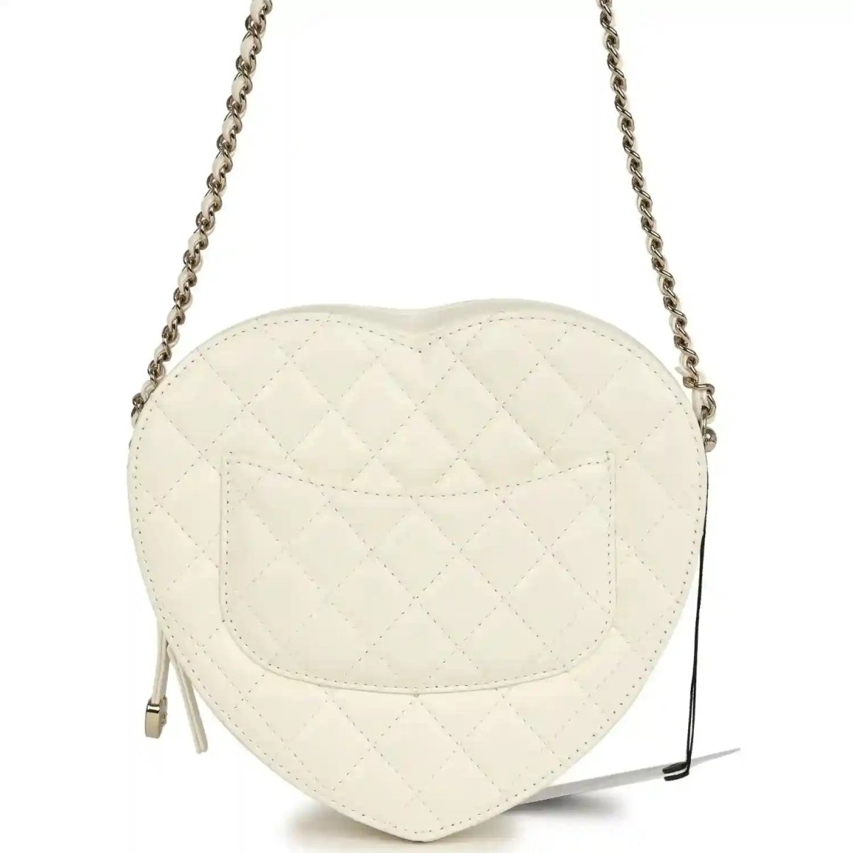 White quilted heart-shaped shoulder bag with flap seam details and chain strap, gold hardware