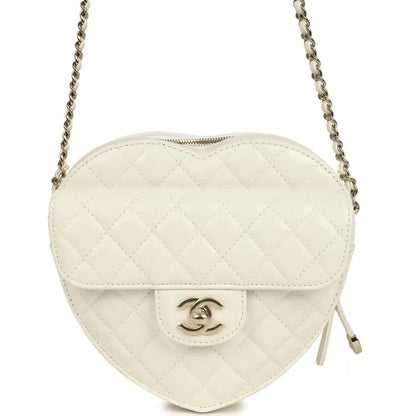 Heart-shaped Chanel shoulder bag in white quilted lambskin with flap and gold CC clasp