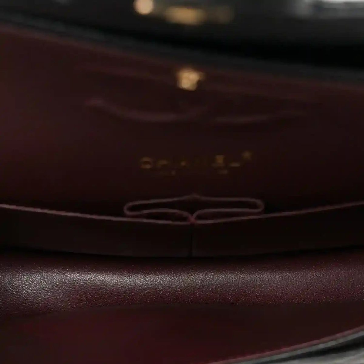 Chanel bag interior with dark lining and trim edge detail