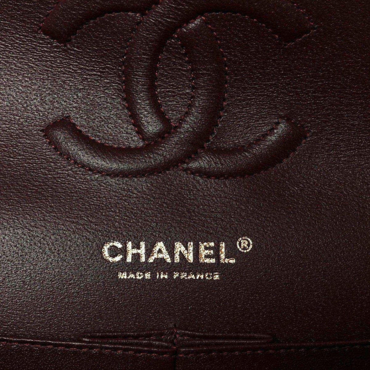 Chanel logo on dark leather lining inside the medium double flap bag