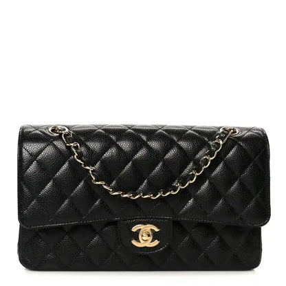 Chanel medium double flap bag in black quilted caviar leather with gold chain strap