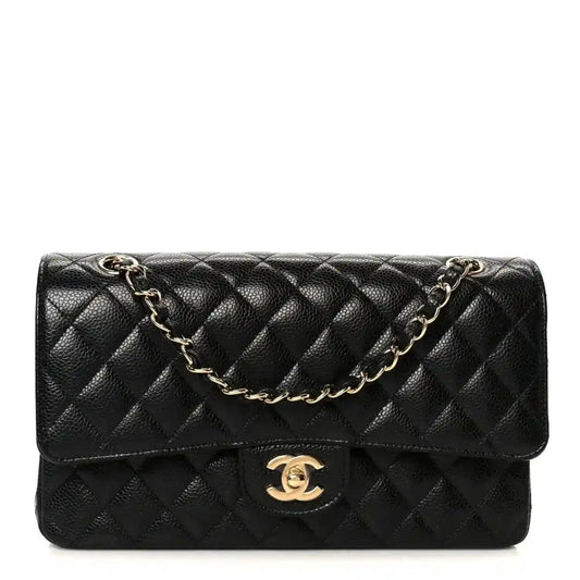 Chanel medium double flap bag in black quilted caviar leather with gold chain strap