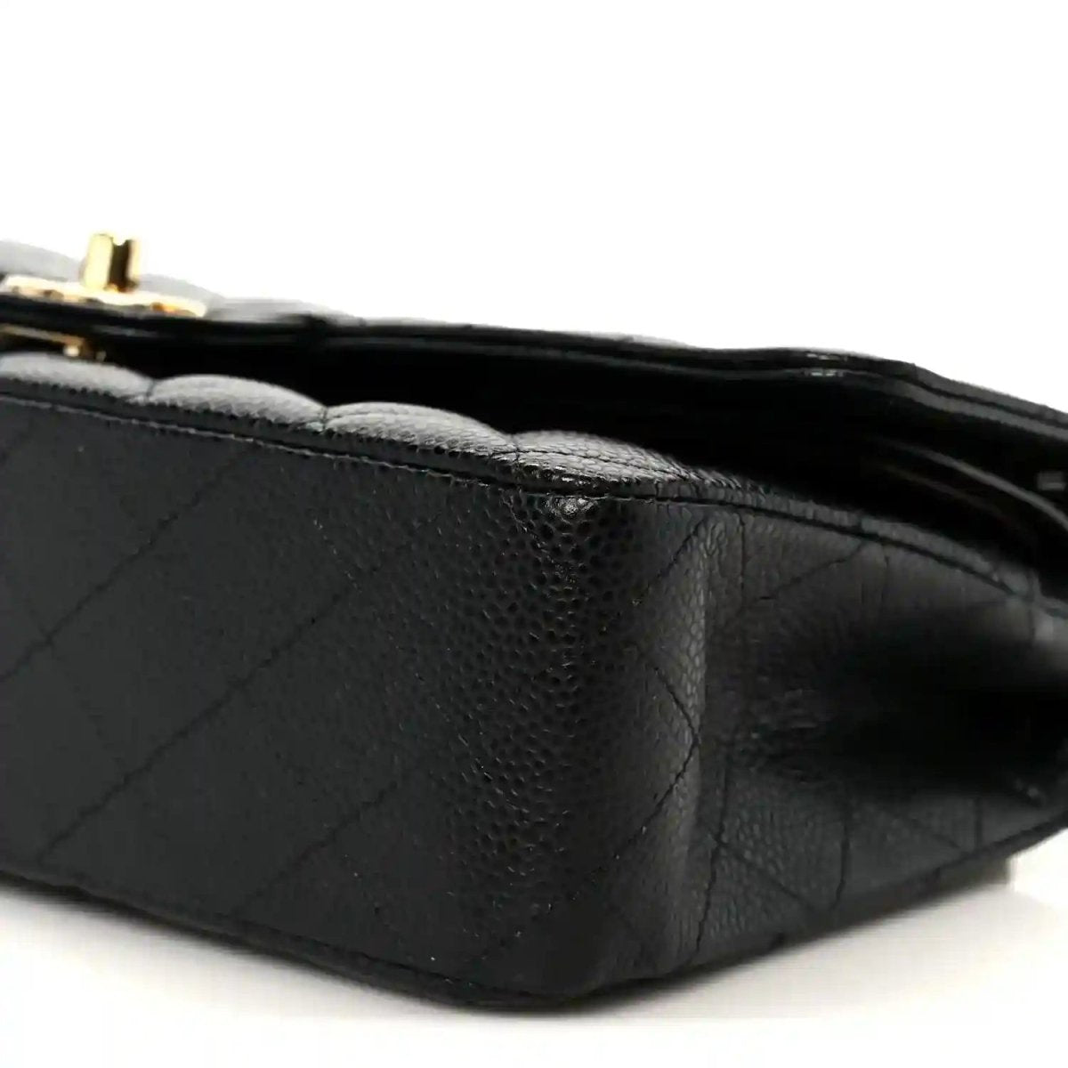 Chanel Classic Medium Double Flap Bag in black caviar leather, side close-up
