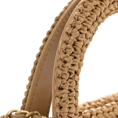 Chanel nano Kelly flap bag, braided raffia side with woven strap and gold trim