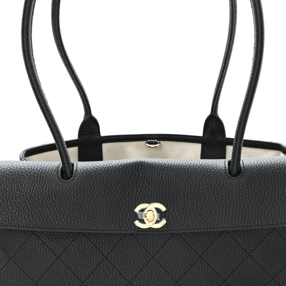 Small black grained calfskin shopping bag with top handles, CC turn-lock and cream lining
