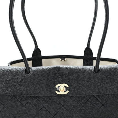 Small black grained calfskin shopping bag with top handles, CC turn-lock and cream lining