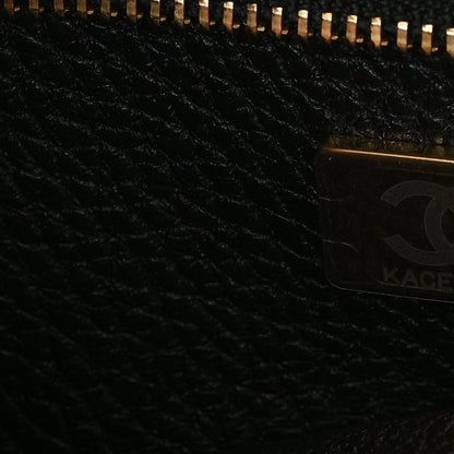 Black textured lining panel with zipper track and embossed detail