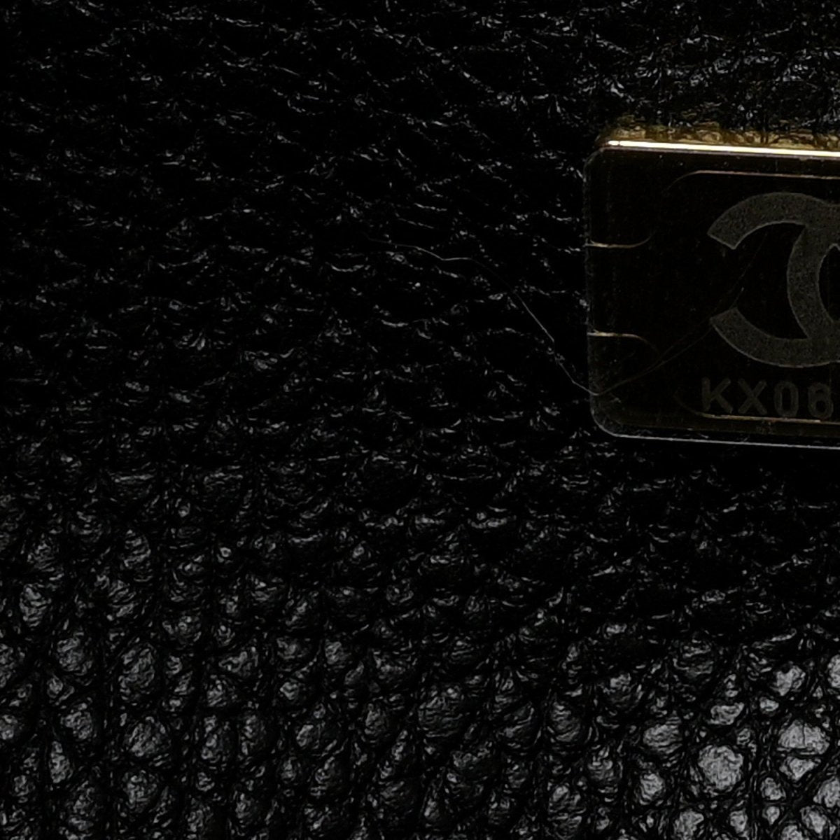 Black leather interior lining with small Chanel hardware label
