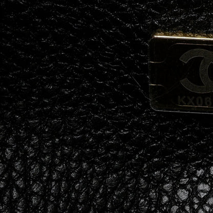 Black leather interior lining with small Chanel hardware label