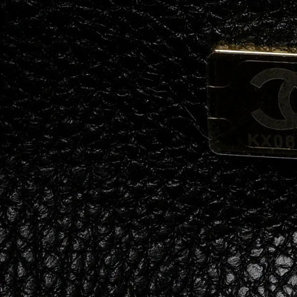 Black leather interior lining with small Chanel hardware label