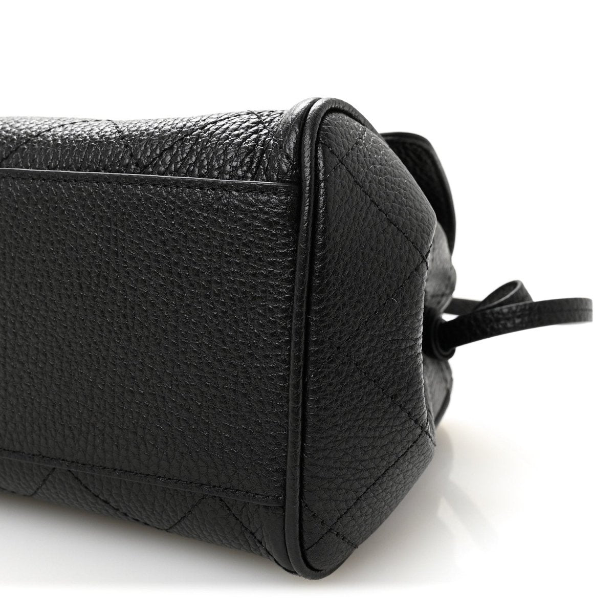 Black grained calfskin small shopping bag with side seam stitching and small strap loop