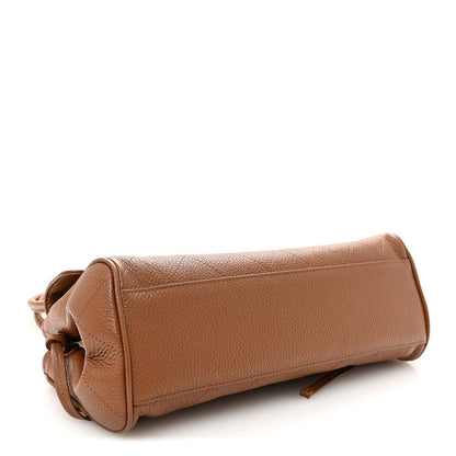 Camel brown small shopping bag base with stitched side panel and handle loop.