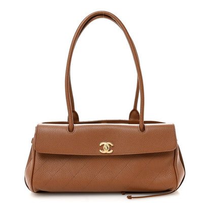 Camel brown grained leather small shopping bag with top handles and CC logo front.