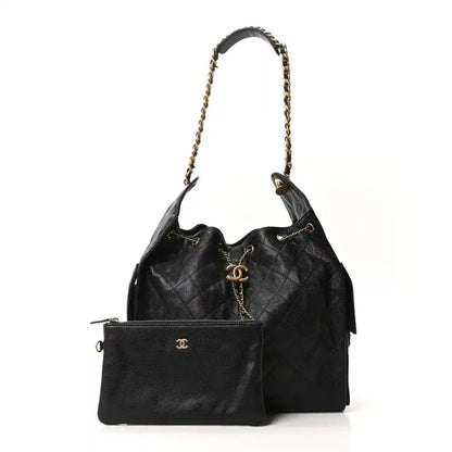 Black quilted leather handbag with chain handle and front flap pocket