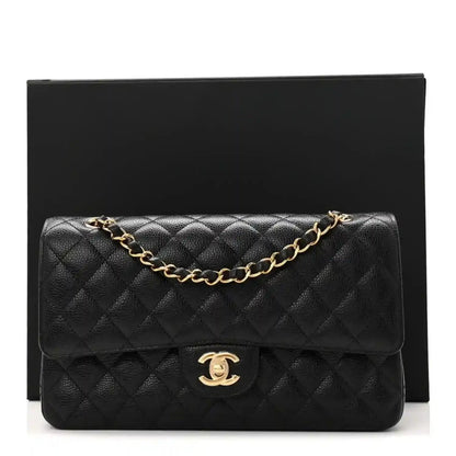 Chanel medium double flap bag in black quilted caviar leather with gold chain strap