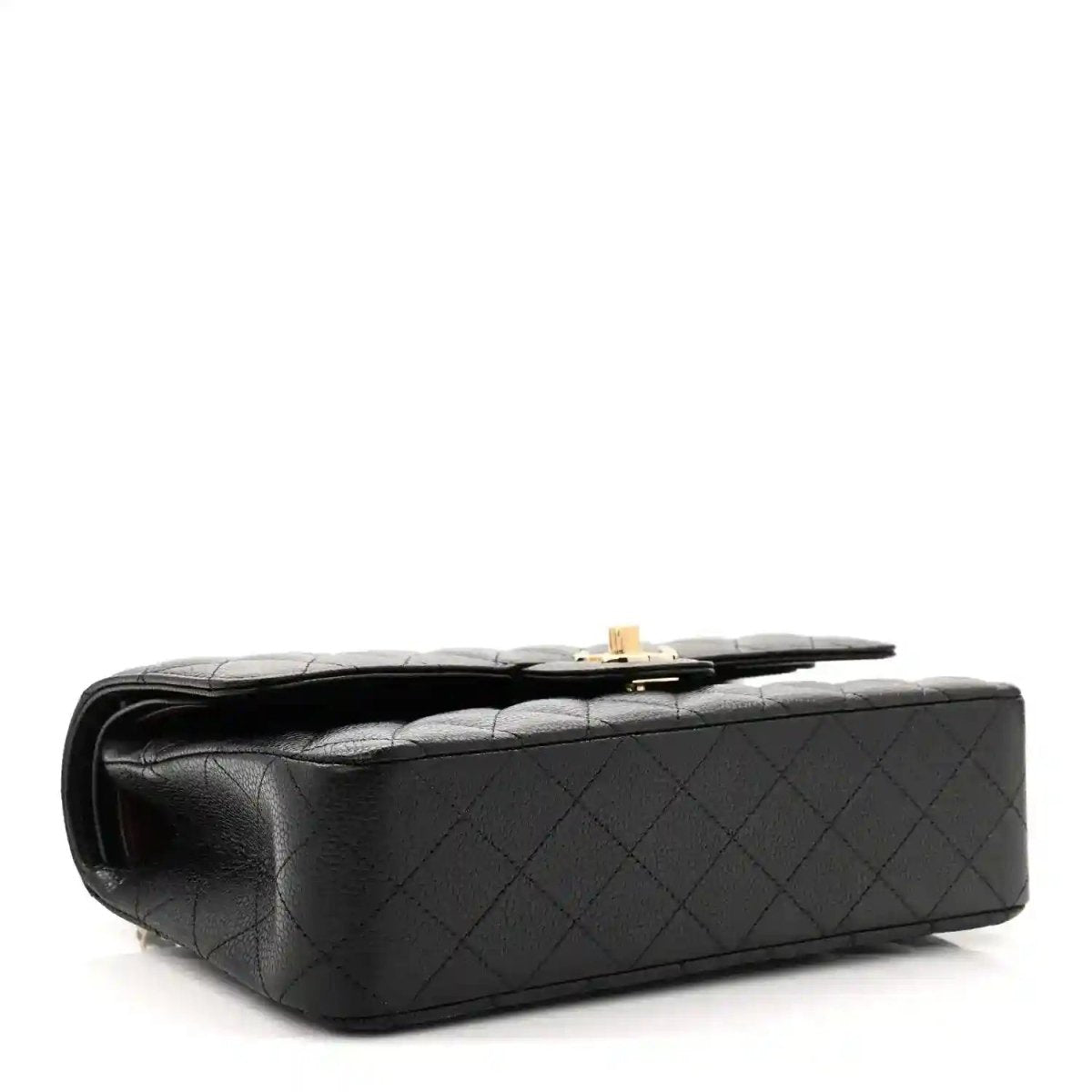 Black caviar leather flap bag underside with gold-tone clasp hardware