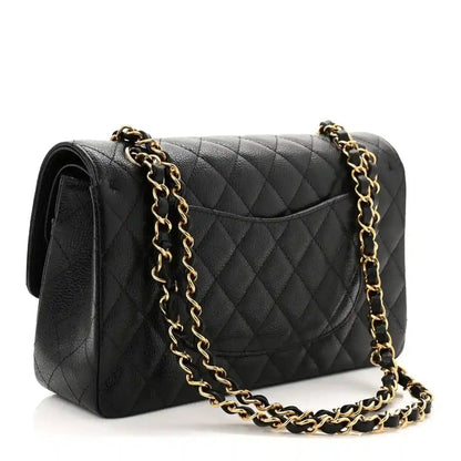 Black quilted caviar leather double-flap bag with gold chain and front emblem