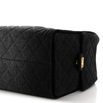 Quilted washed denim shoulder bag with leather-trim flap and gold turnlock