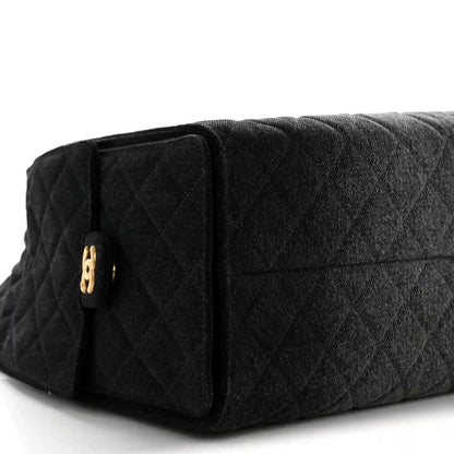 Chanel medium quilted denim shoulder bag in black with gold side emblem